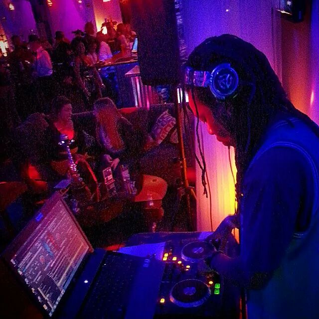 DJ Mandatory at Liquid venue with red lighting